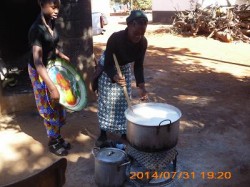 MOPH 013 The older girls preparing Nshima for Lunch